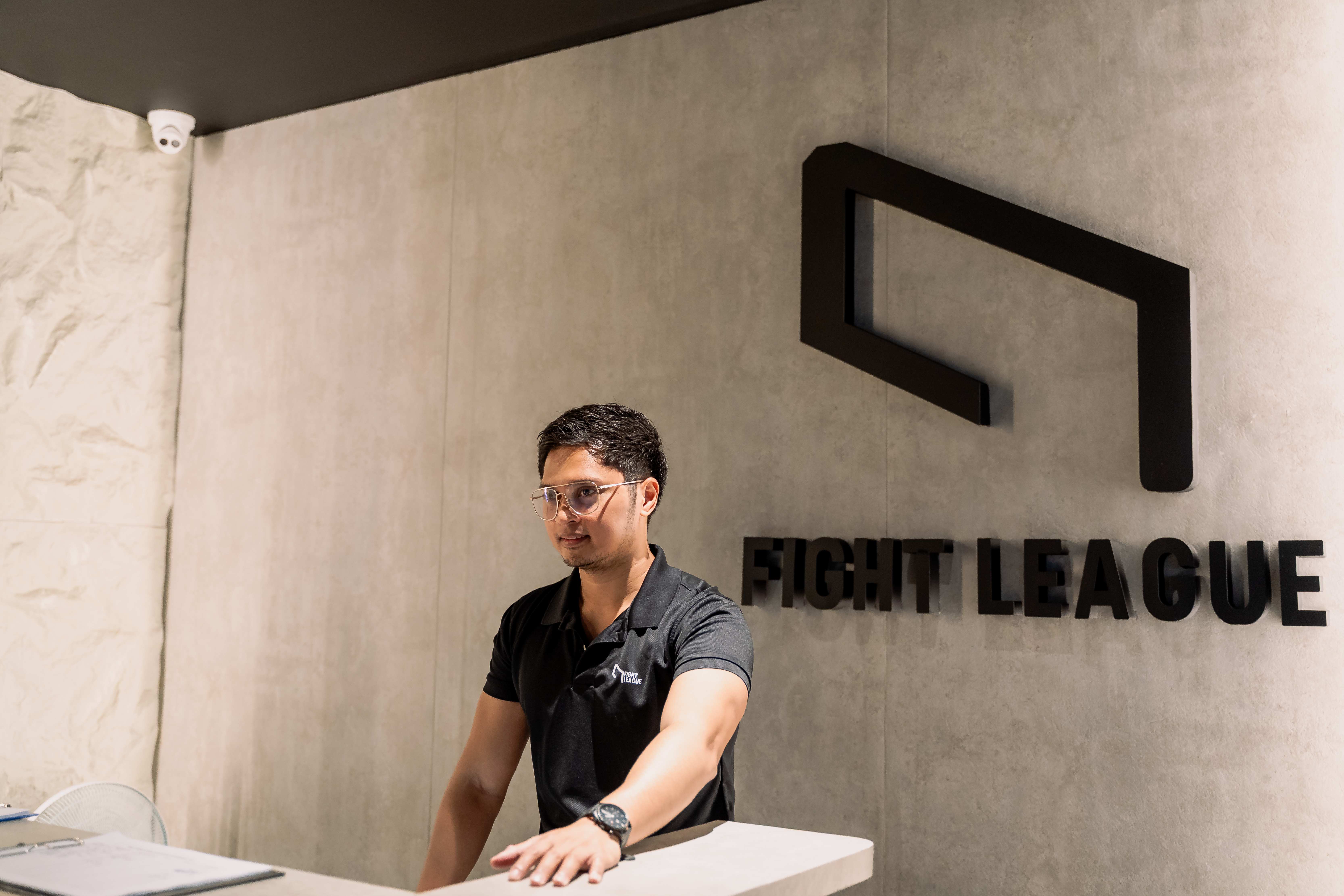 Fight League team assisting a caller with her concern